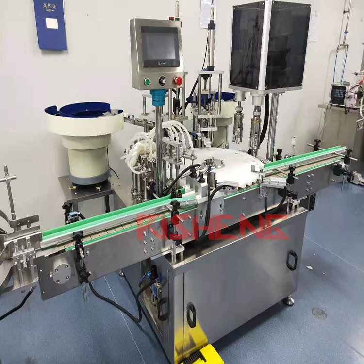 Electronic cigarette oil filling and capping machine for small doses of creams and liquids